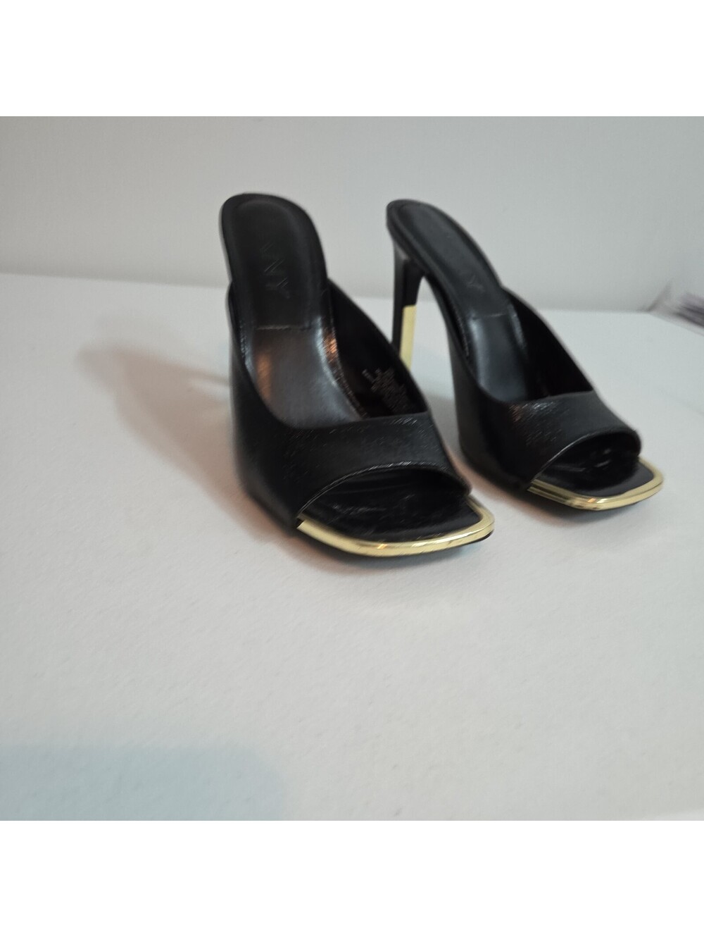 women's black DKNY square-toe heeled mules size 10M